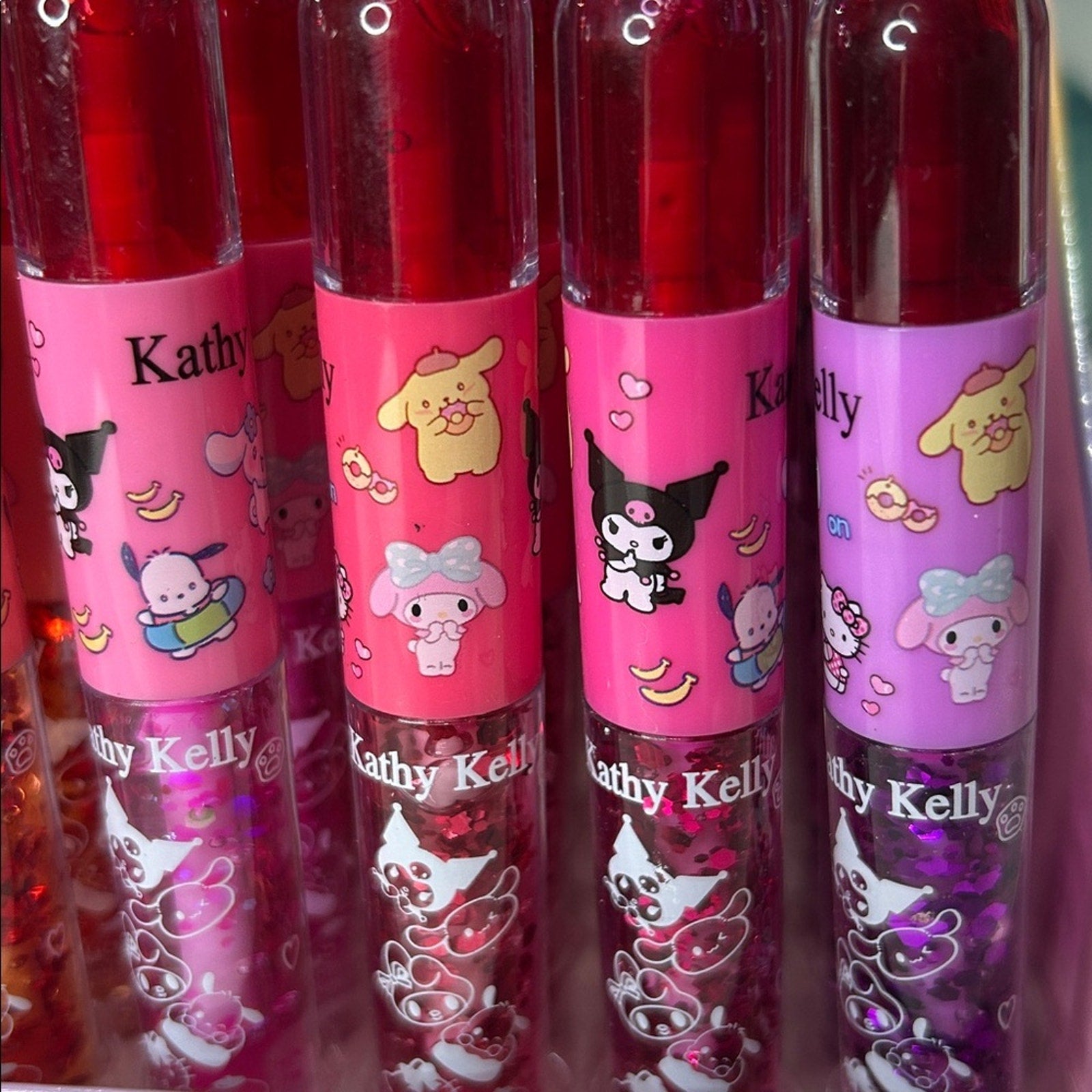 Lip tint and lip gloss. One of each side. Set of 4