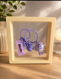Purple M&M bag charm