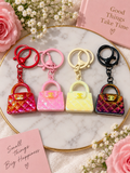 4 bag charms/ keychains with C initials