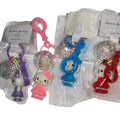 Hello Kitty bag charms set of 6 purple, pink, blue and red